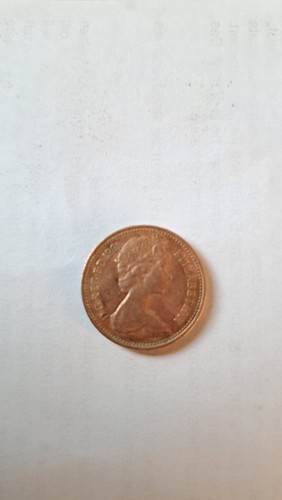 New penny reg d - 1,